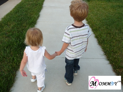 Brother and Sister Holding Hands